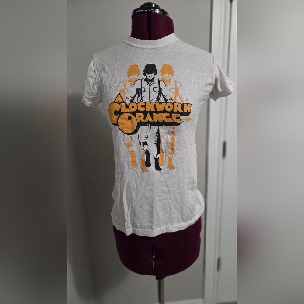 White and Orange Short Sleeve Tee with Retro Graphic